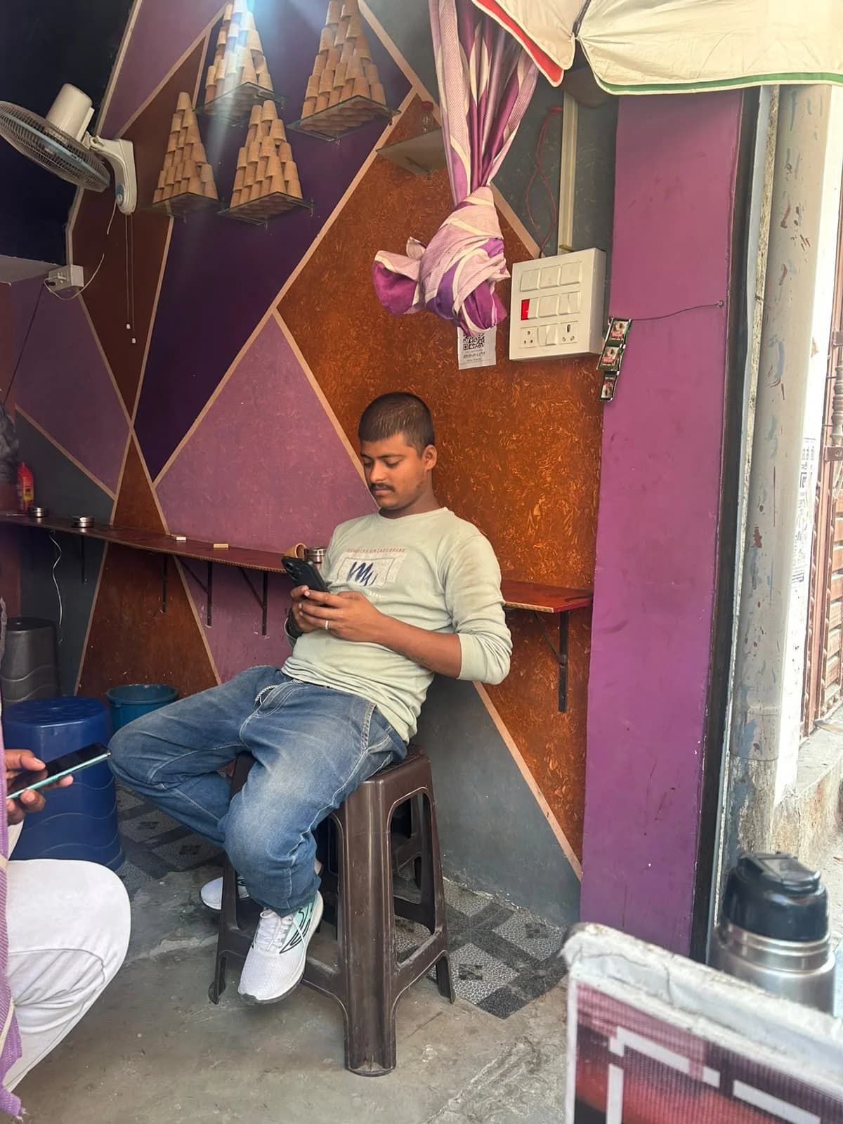 Inside Sharma Tea Stall customer seating lounge and snack area near Balaji Hospital in Pipiganj
